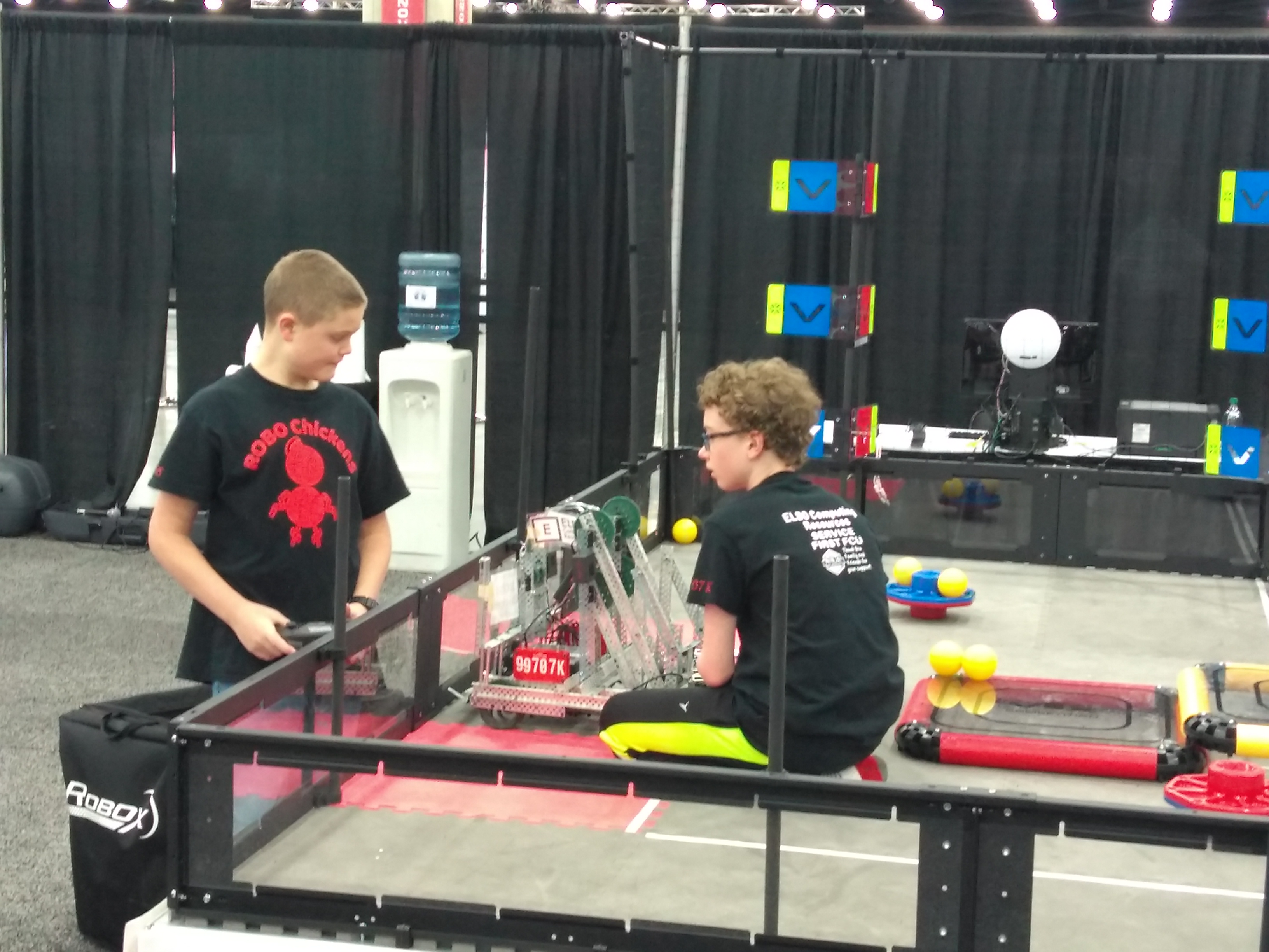Working on robot at practice field